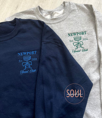 Navy and gray personalized sweatshirts with Newport Social Club embroidery