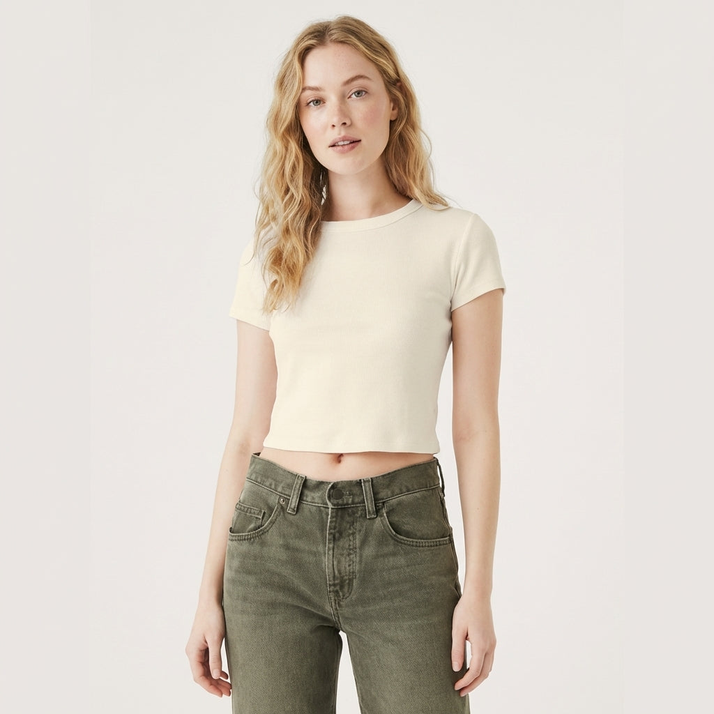 Model wearing a plain cream baby tee